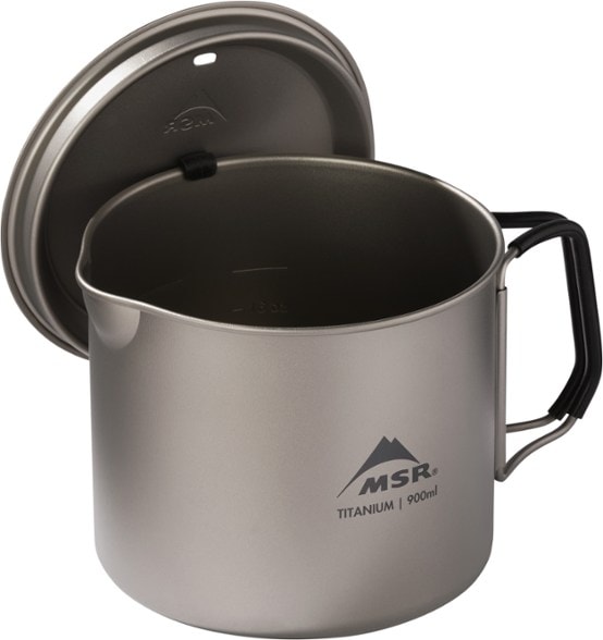 Side view of the ultralight Titan kettle showcasing the silicone-coated folding handles.