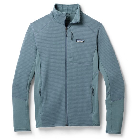 Front view of men's Patagonia R1 jacket worn during a mountain hike – lightweight fleece jacket for backpacking