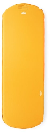 KiddoComfort sleeping pad in a camping setup, showcasing its bright colors.
