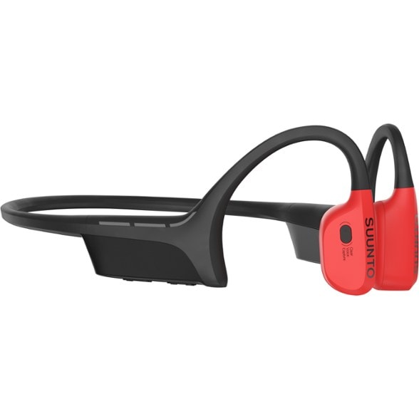 Suunto Wing headphones showing LED lights while on a running trail.