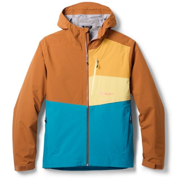WeatherShield 3L men's hiking jacket shown in action on a mountain trail during a rainstorm.