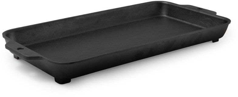 Large cast iron griddle on a BioLite fire pit, showcasing the cooking surface and raised edges.