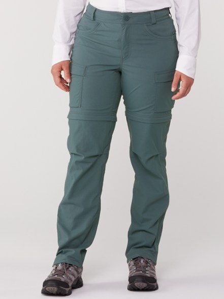 Eco-Friendly Women's Zip-Off Hiking Pants in action on a hiking trail