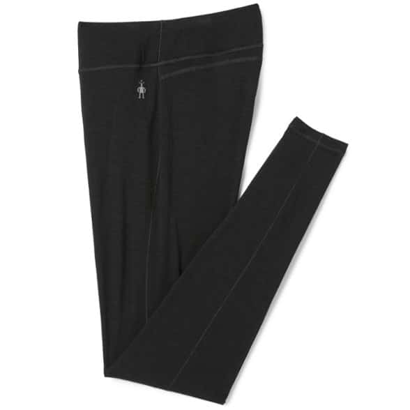 Close-up of women's merino wool base layer pants showcasing the fabric's softness and durability.