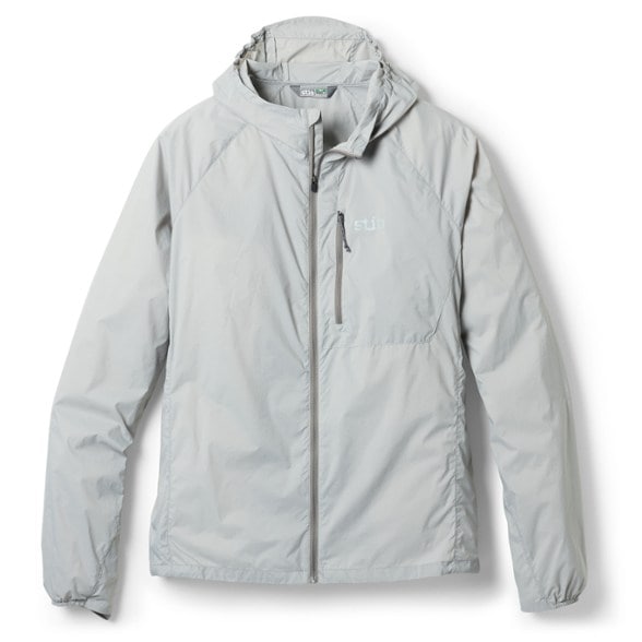 Front view of Alpine Drift wind shell worn on alpine ridgeline, showcasing lightweight design