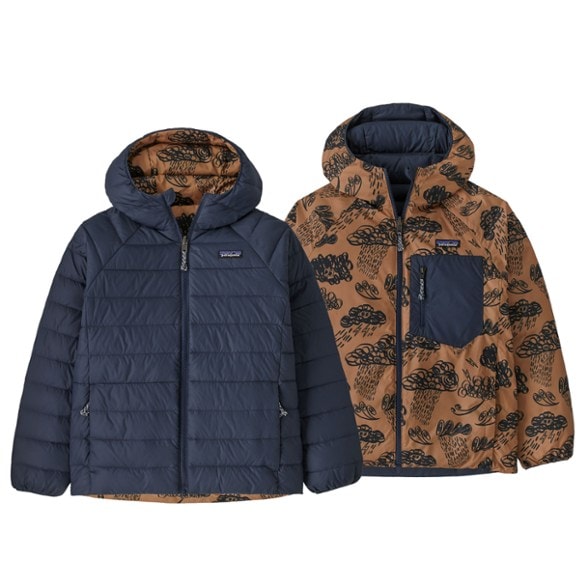Front view of reversible hoodie in solid navy, showing zippered pockets and fitted hood.