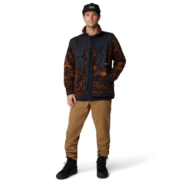 Mountain Explorer Active Pants displayed in a hiking setting, highlighting their flexibility and comfort.