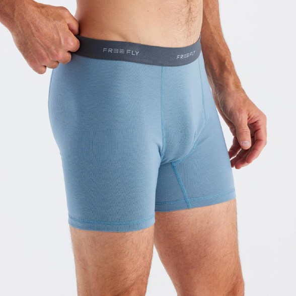 Elevate Fresh Comfort Men's Boxer Briefs on a sporty background showcasing flexibility and comfort.