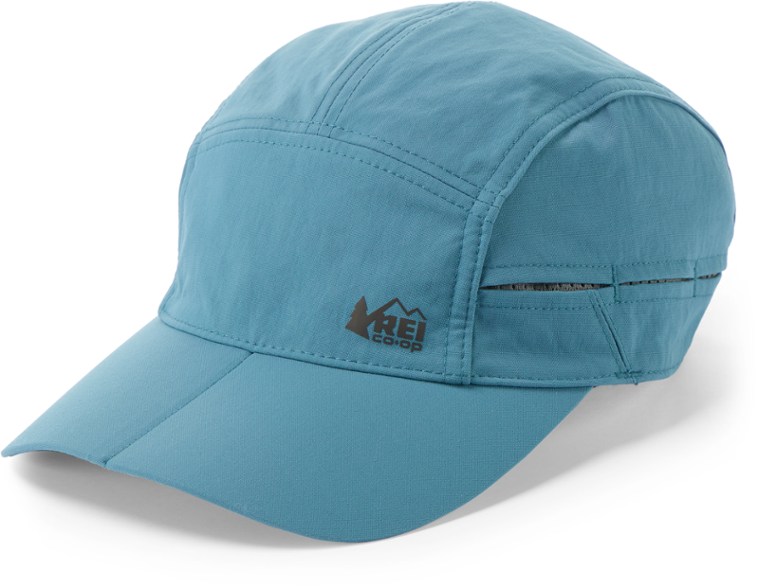 Front view of sun protection hat with folding brim, worn on hiking trail