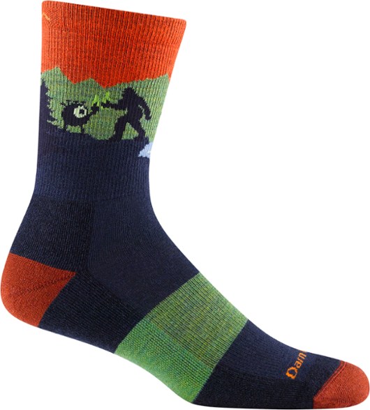 Close-up side view of comfortable midweight hiking socks showing ribbed cuff and merino wool texture