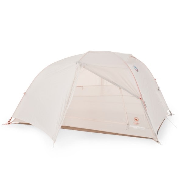 Side view of the Big Agnes Copper Spur Ultralight 2 tent setup in a mountainous landscape.