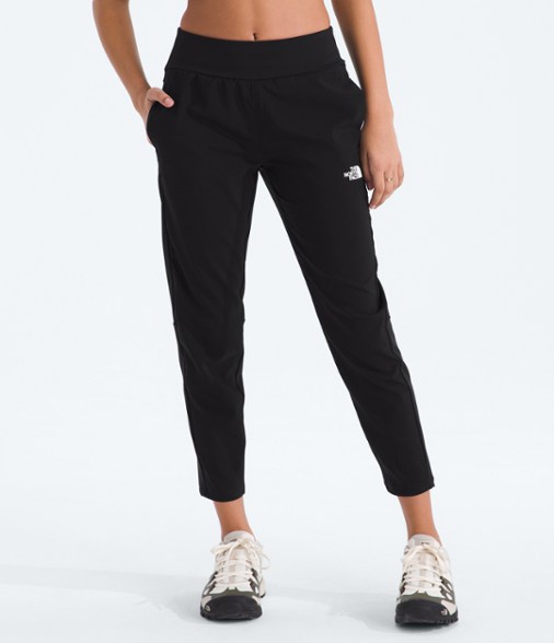 Front view of Adventure Ready girls hiking pants in a natural outdoor setting.