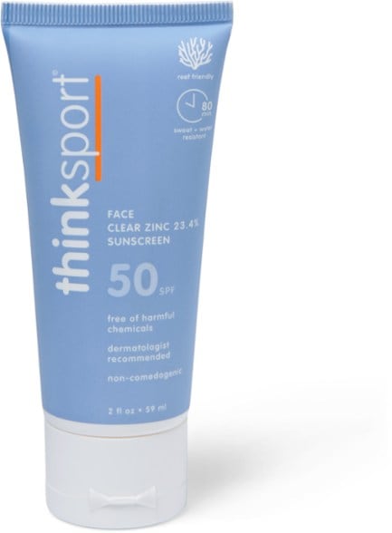 Thinksport Clear Zinc Active Face SPF 50 sunscreen applied on skin, showcasing its clear application.