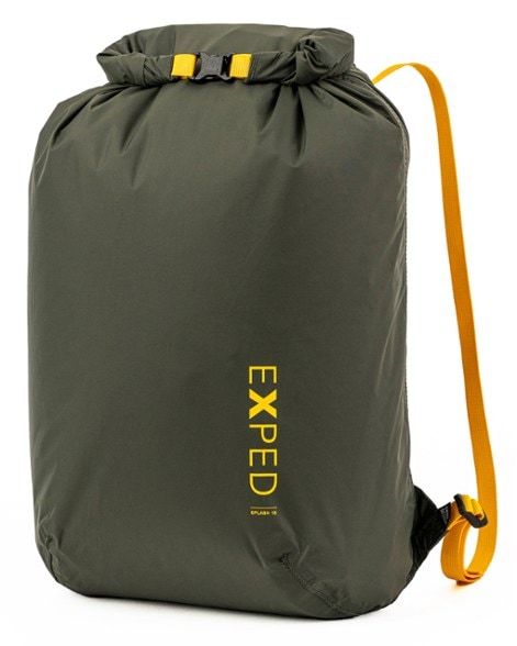 AquaGuard 15 Waterproof Backpack in a hiking setting, showcasing its roll-top closure and adjustable straps.
