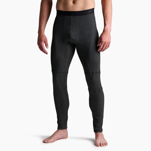 KUHL Reactiv Lite thermal pants for men, showcasing the high-tech carbon-infused fabric and articulated design.