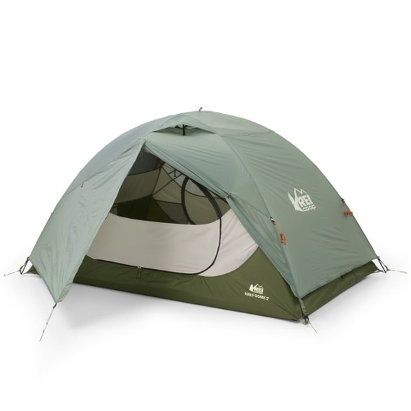 REI Co-op Half Dome 2-person backpacking tent pitched in forest with rainfly on