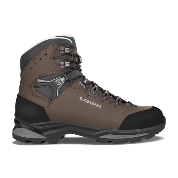 Lowa Camino Evo LL hiking boots displayed from the side, highlighting the flexible ankle support and durable leather exterior.