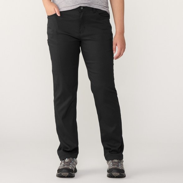 Front view of women's hiking pants showcasing stretch fabric and pockets.