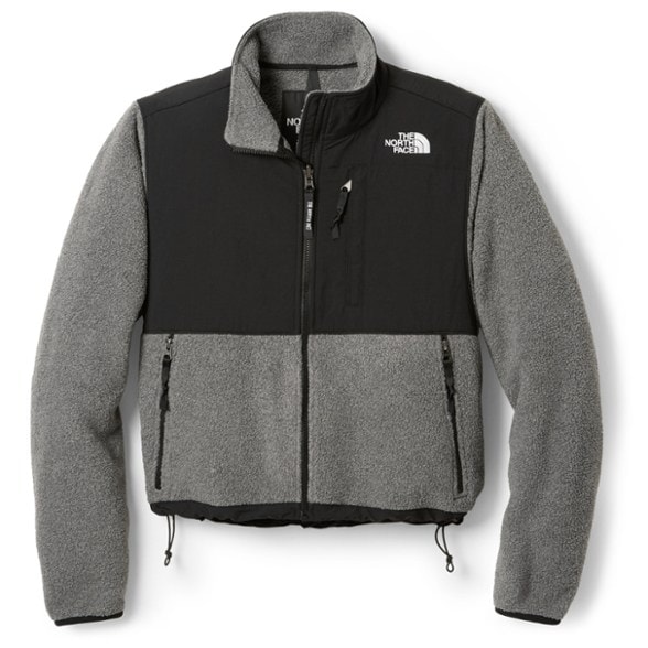 Front view of North Face Women's Retro Denali Fleece Jacket worn on a hiking trail.
