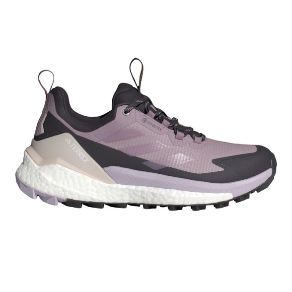 Side view of women's waterproof hiking shoes showing breathable PRIMEKNIT upper and lace-up closure