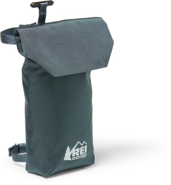 Packmod waterproof rainshield pocket attached to a backpack, highlighting the secure hook-and-loop closure.