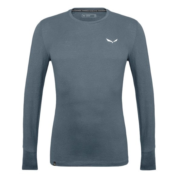 Men's long sleeve hiking shirt shown in action on a mountain trail.
