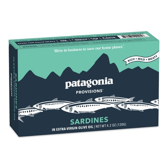 Close-up of wild caught sardines packed in BPA-NI aluminum can, highlighting sustainable seafood packaging
