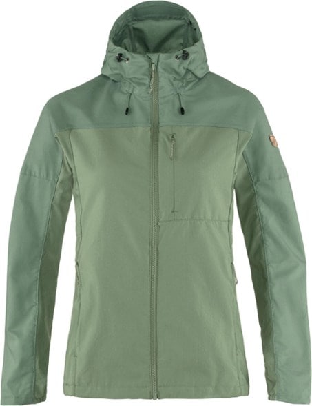 Fjallraven Women's Abisko Midsummer jacket displayed in a lush forest during a hike.
