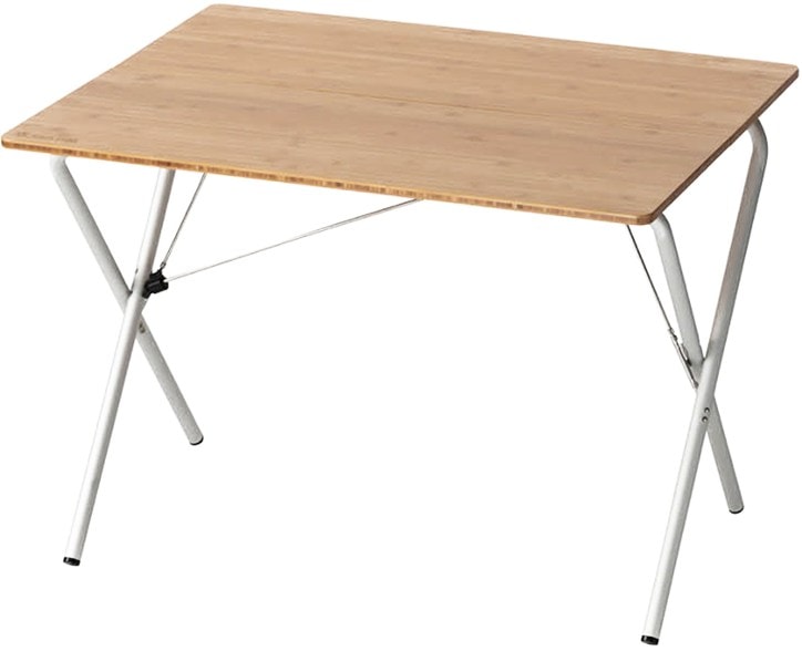 Bamboo folding camping table set up for dinner outdoors