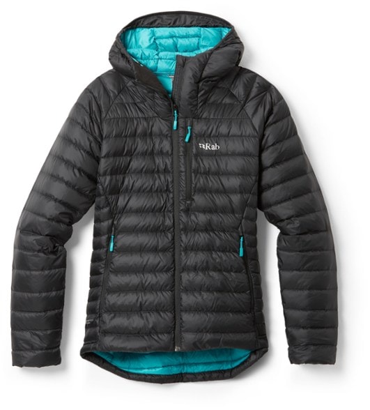 Eco-Friendly Women's Insulated Down Jacket shown in outdoor setting, highlighting its adjustable hood and pockets.