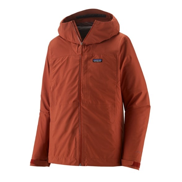 Front view of the AlpineShield men's hiking jacket showing waterproof zippers and sleek hood design