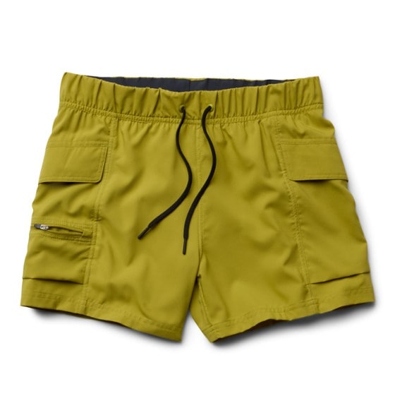 Trailblazer Women's Hiking Shorts in action on a mountain trail, showcasing UPF 50 sun protection.