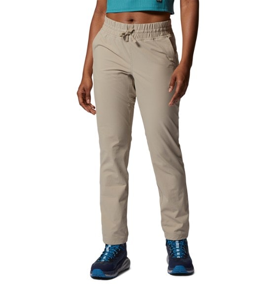 Basswood Women's Stretchy Outdoor Pants showing front view in a hiking setting.