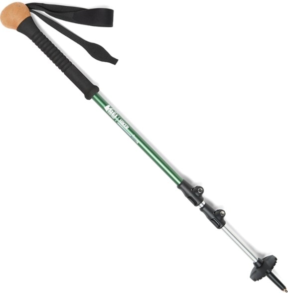 ErgoTrek Adjustable Hiking Pole with ergonomic grip on a rocky trail