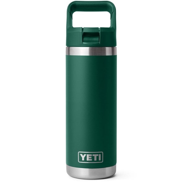 YETI Rambler insulated water bottle at a campsite with a straw cap.