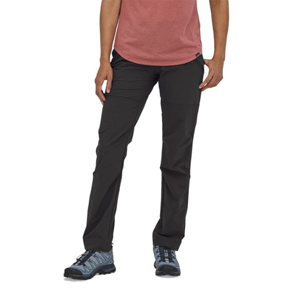 Front view of EcoTrail women's trail pants showing water-repellent fabric and slim fit design