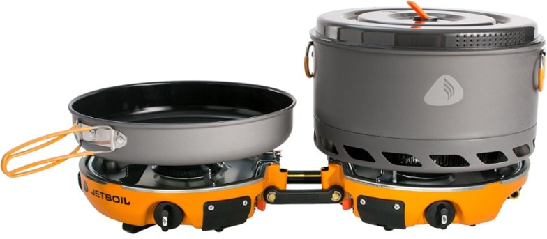 Top-down view of Jetboil Genesis Basecamp stove fully set up with cookware outdoors