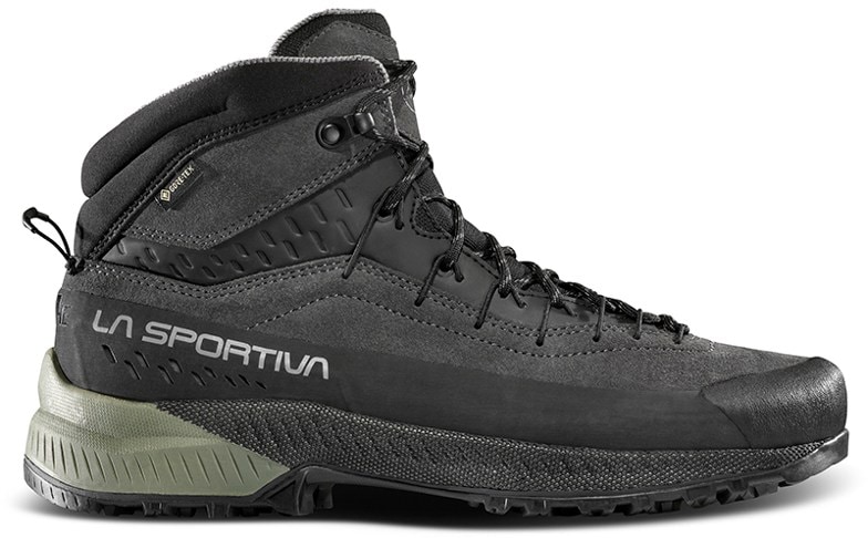 La Sportiva TX4 EVO Mid GTX approach boots showcasing the Vibram outsoles on rocky terrain.