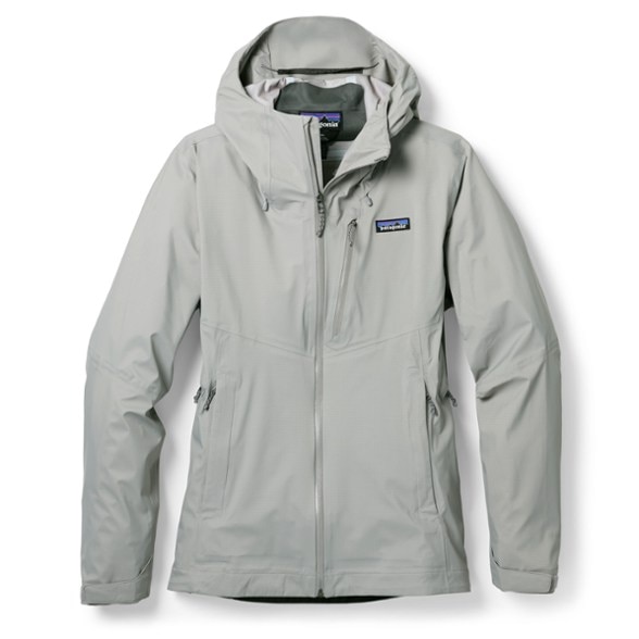 Granite Crest Women's Jacket shown in a hiking environment, demonstrating waterproof features.