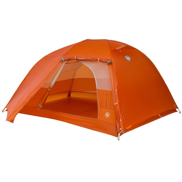 Big Agnes Copper Spur UL3 tent set up in a scenic campsite with mountains in the background.
