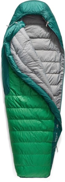 Sea to Summit Ascent 30F lightweight sleeping bag fully zipped in a forest campsite showcasing its mummy shape and hood