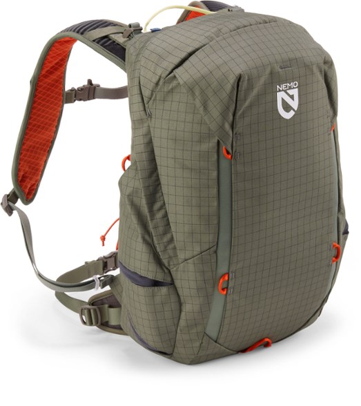 Men's Resolve 25L backpack showcasing its water-resistant exterior on a hiking trail.