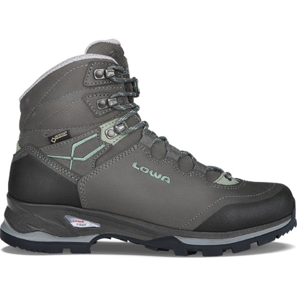 Lowa Lady Light GTX Women's Hiking Boots in action on a rocky hiking trail, highlighting their waterproof features.