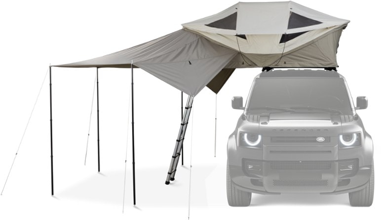 Thule Approach vehicle awning set up beside a small roof-top tent.
