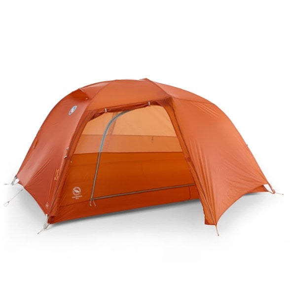 Big Agnes Ultralight Backpacking Tent Duo set up in a forest, showcasing its spacious interior.