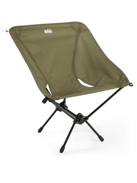 Side view of Flexlite Trekker portable chair set up on rocky terrain during a hiking trip