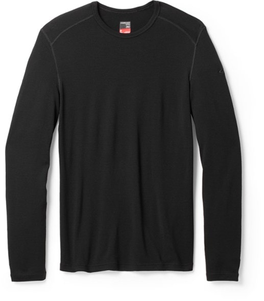 Men's Merino 260 Tech Thermal Top displayed outdoors, perfect for snowsports.