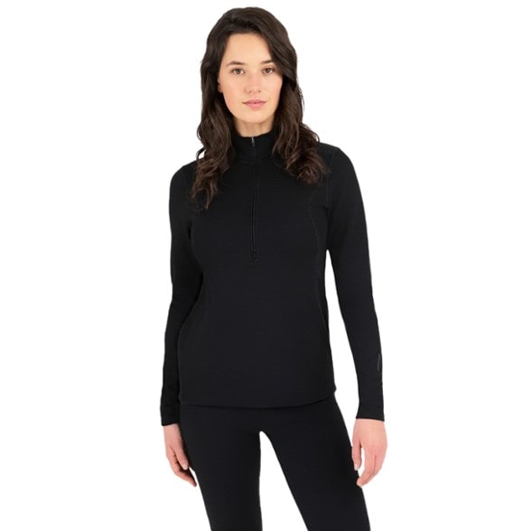 Close-up of the women's Merino wool half-zip thermal base layer top, highlighting the brushed microfiber texture.