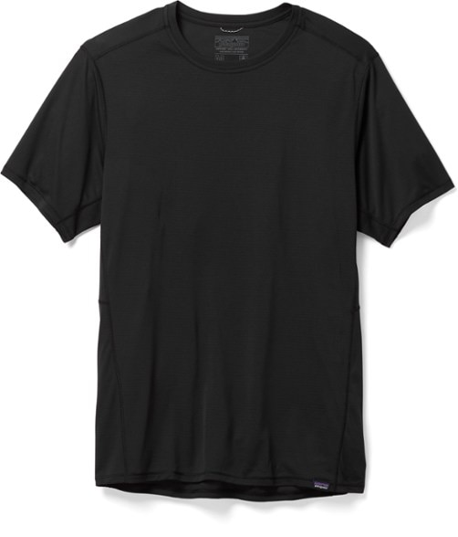 Patagonia CoolFlow Lightweight Performance Shirt in action outdoors, highlighting its breathable fabric.