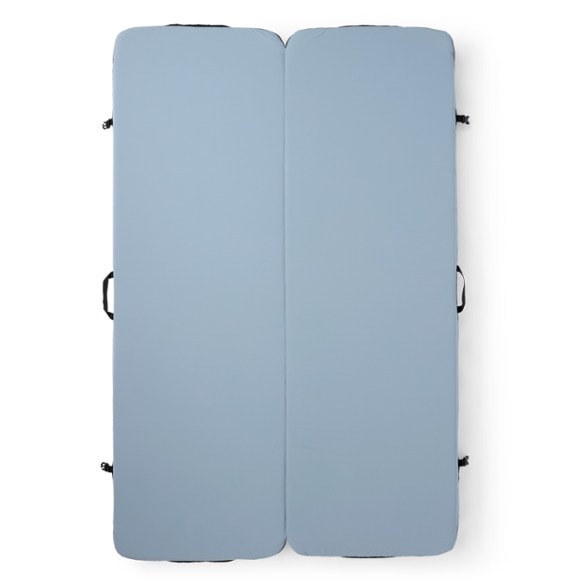 Luxury Duo Camping Mattress in a serene outdoor setting, highlighting its two-layer foam construction.
